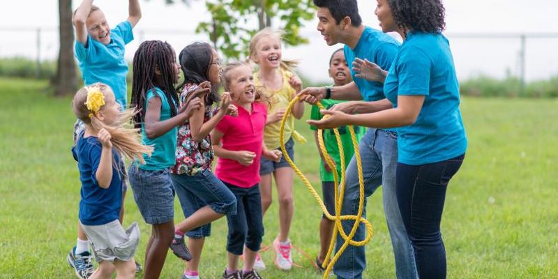 Smiling children excited for activities on a summer's day.