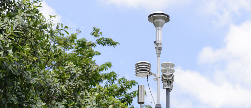 The pollution detector station in a park.