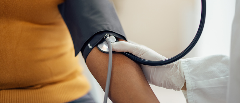 Adult having a blood pressure check