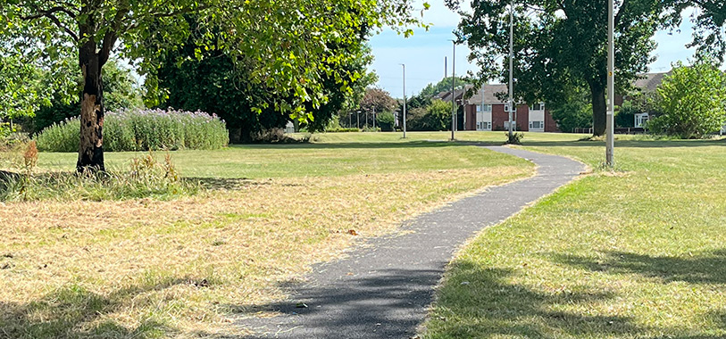 Path with street lighting in Bunbury Green.