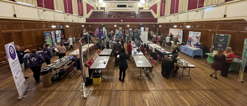 Stall holders showcase the range of services they provide.