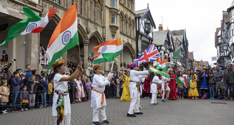 Children flying flags at a Diwali festival in Chester.