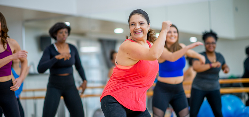 Group of people at exercise class at the gym.