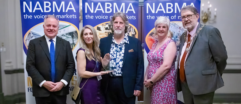 Left to right are Simon Baynes MP - Chairman of the All Parliamentary Markets Group, who presented the award to the Council’s Adele Thomas - Chester Market Manager and Rob Monaghan - Strategic Markets Manager with Katherine Brown from Award Sponsors Blachere Illumination and Councillor Chris Poulter, President of NABMA.