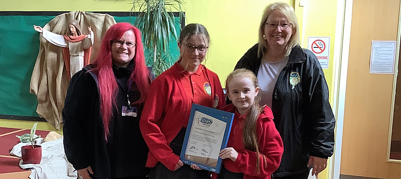 L to R: Road Safety Officer Gemma Rhodes; Junior Safety Officers, Urszula and Chloe and Vikki Abbate, JSO Buddy from the school.