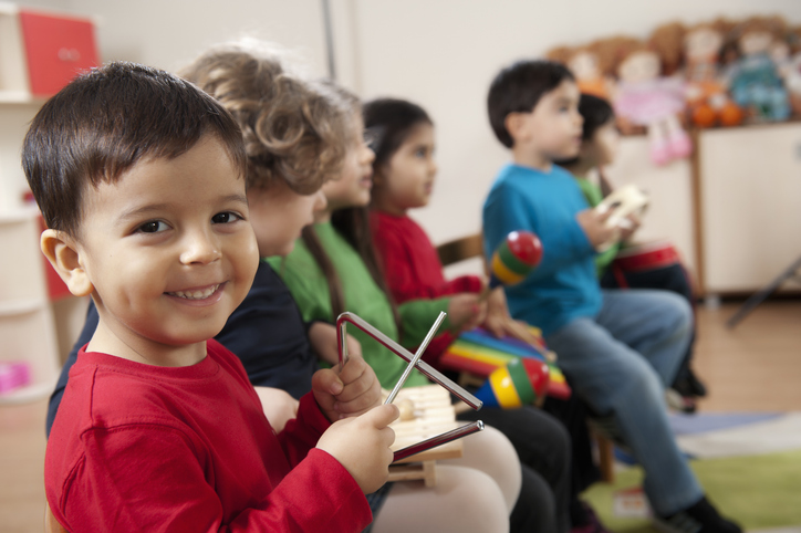 Preschool age children in music class stock photo