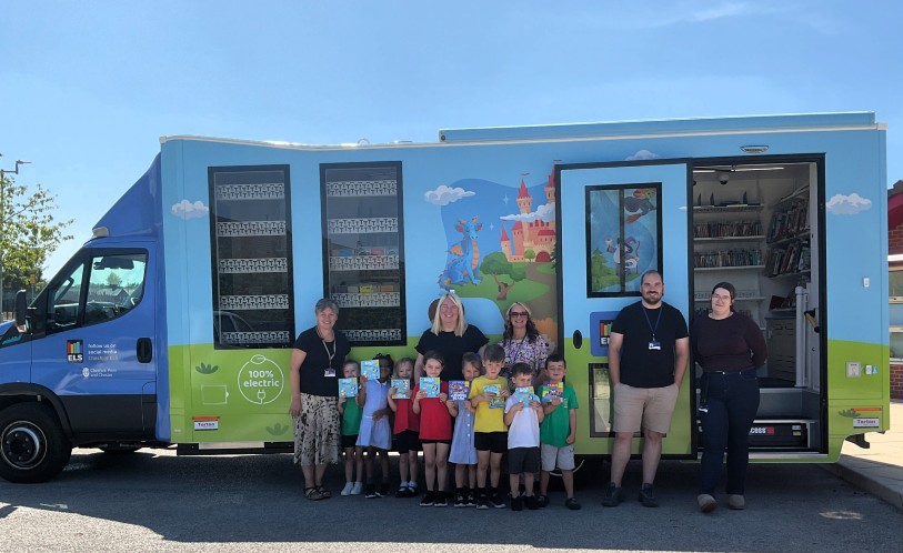 The Education Library Service's all-electric Book Bus visits William Stockton Primary School