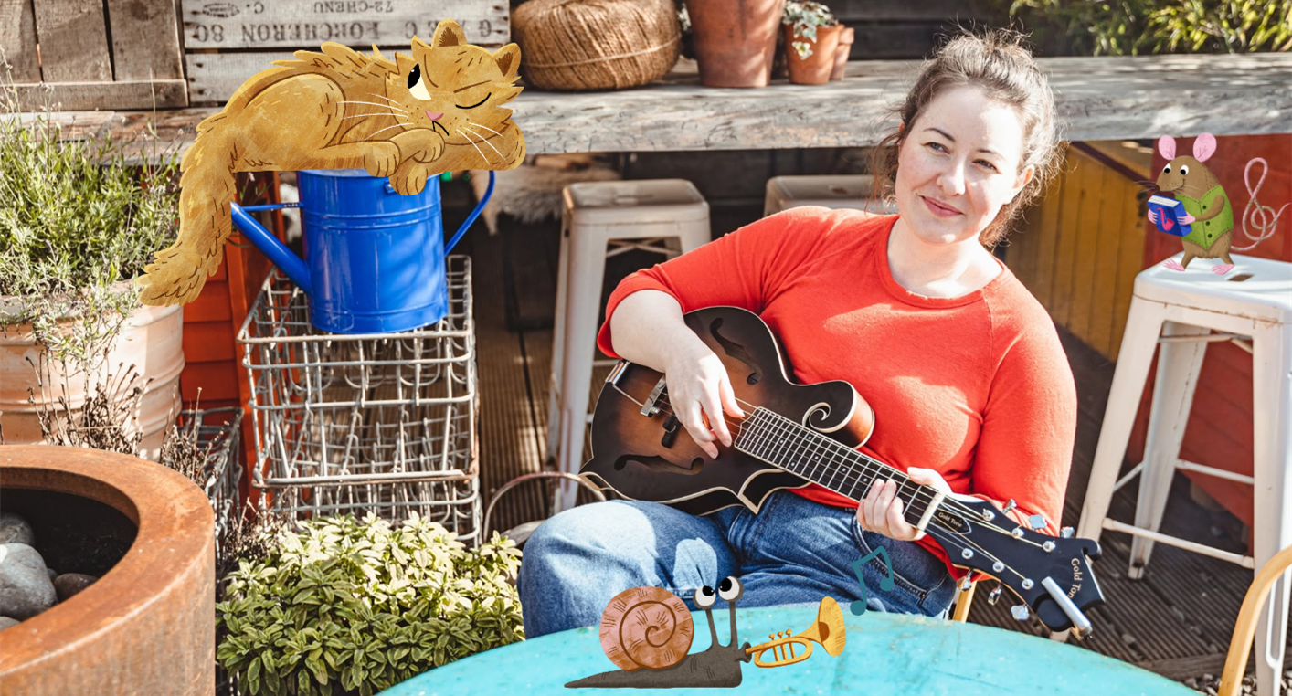 An image of Ashley Fayth playing guitar