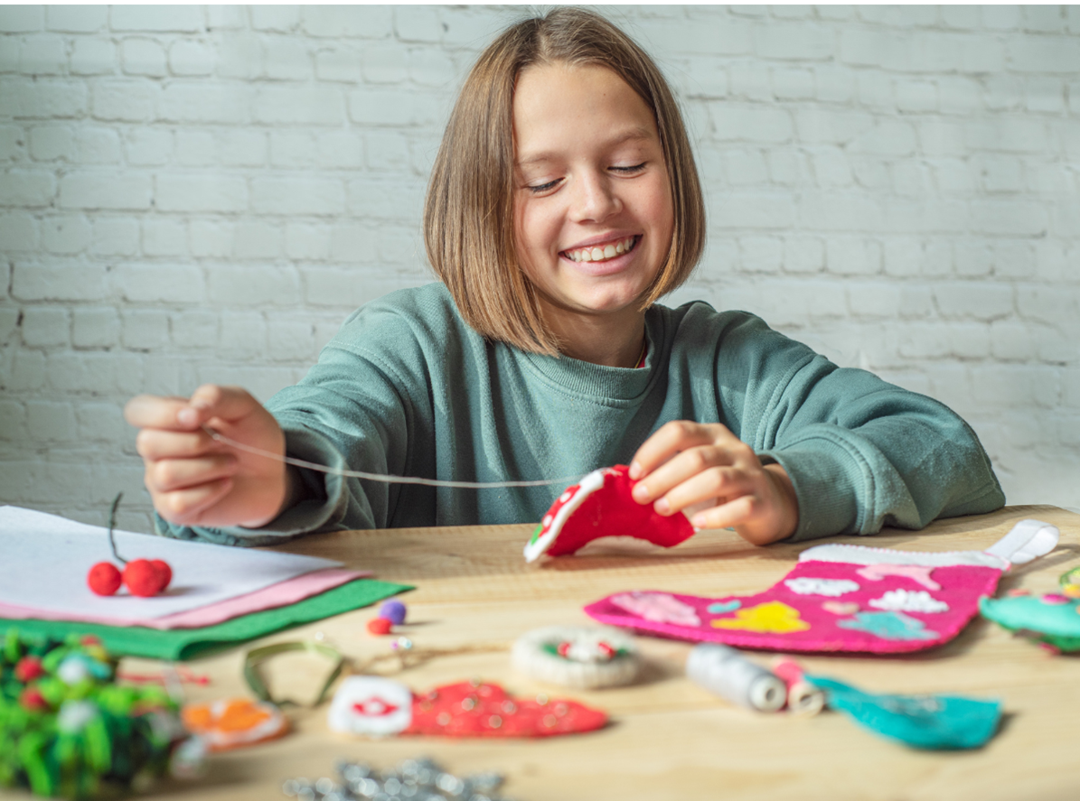 A child doing Christmas crafts