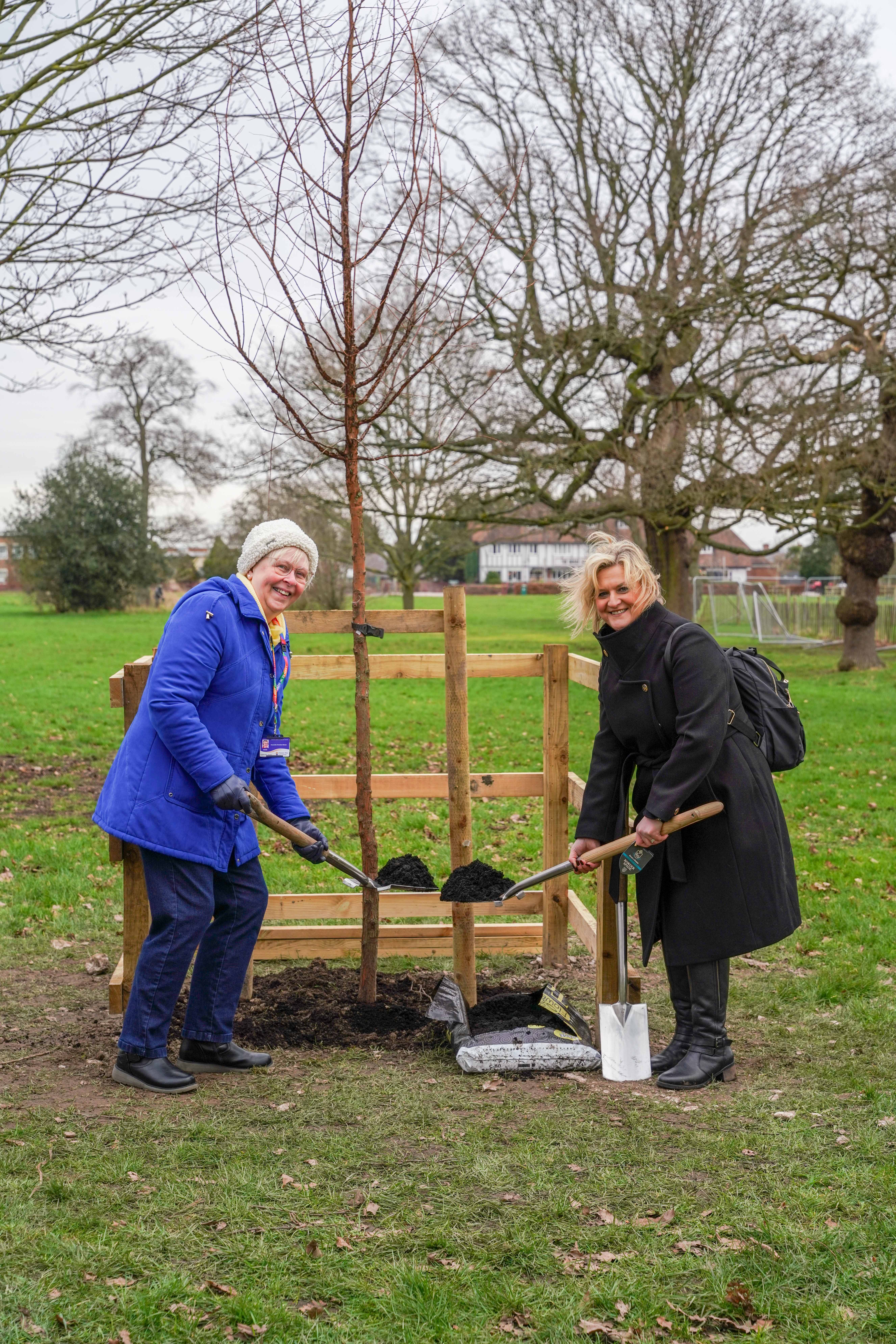 Cllr Christine Warner and Cllr Karen Shore planting a tree at Whitby Park