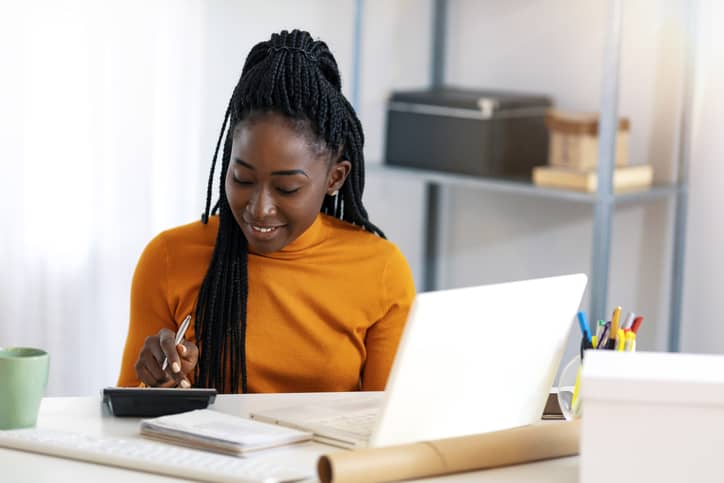 Woman calculating data