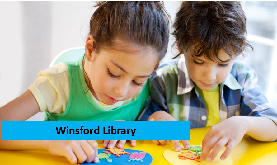 two children making crafts