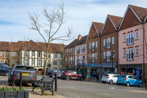 A mixed use building with ground floor retail and residential above at the heart of a 1,200 home development, Bolnore, West Sussex.