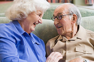 Image of elderly couple talking