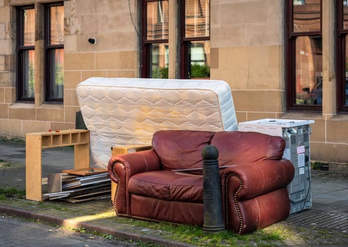Furniture items left by fly-tippers