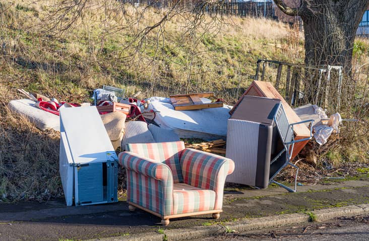Furniture items left behind by fly-tippers