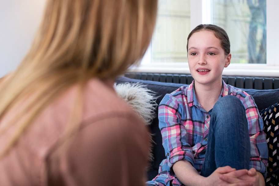 Girl talking to foster carer.