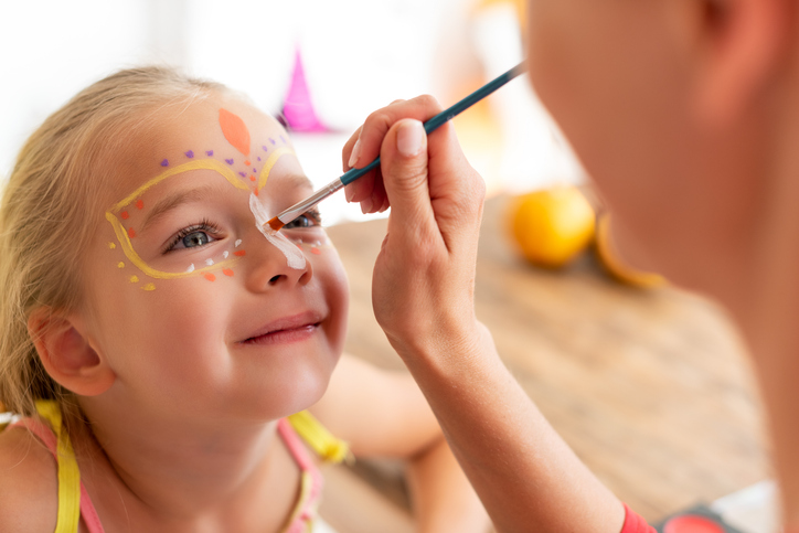 child getting face painted