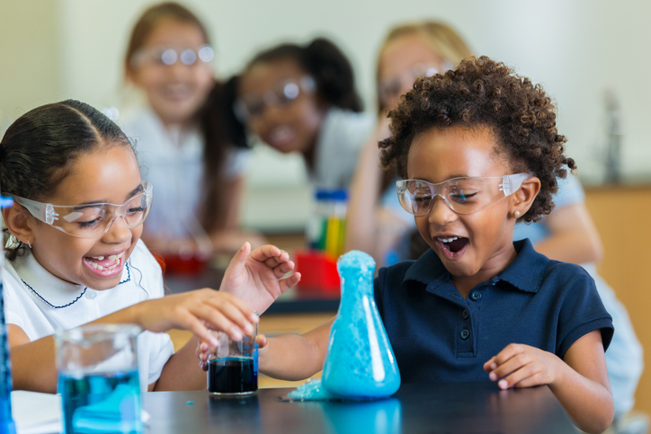 children doing a science experiment