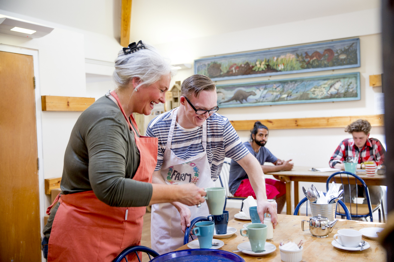 Volunteers helping out at a community café