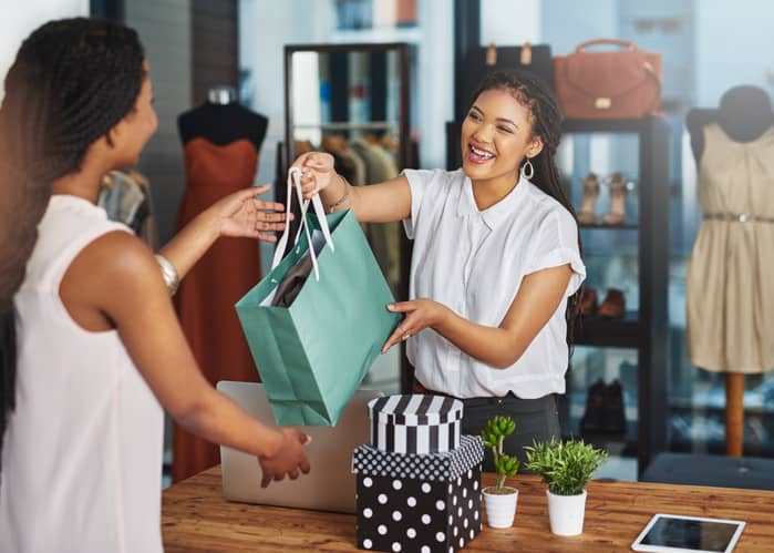 Woman shopping in-store on the high street