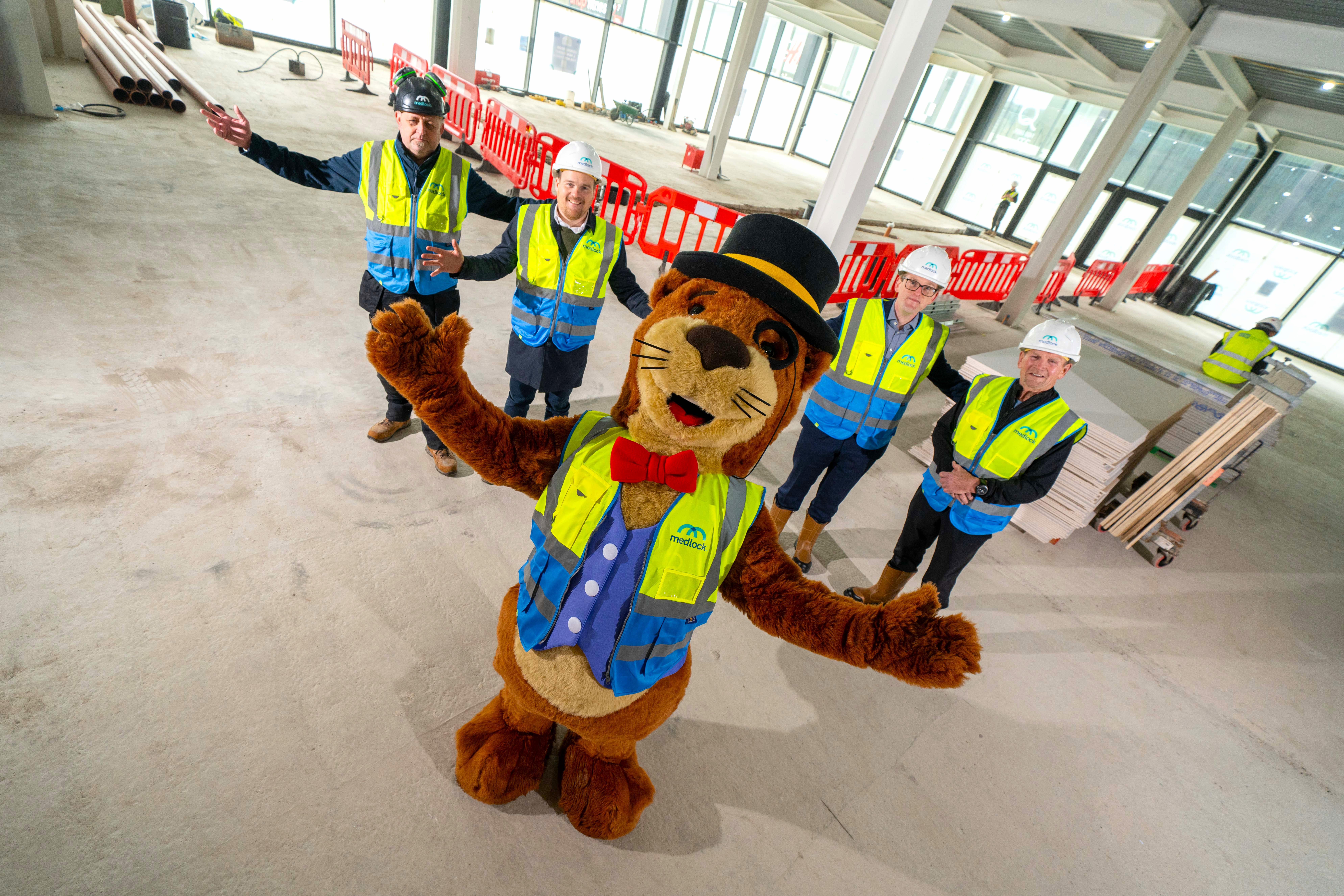 Barons Quay mascot Baron Lutra with Medlock and councillors