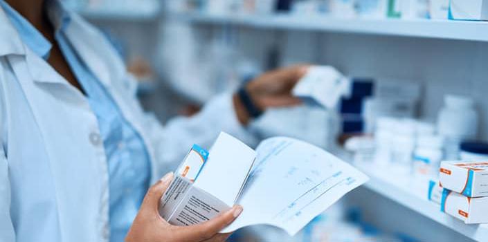 Pharmacist choosing medicines.