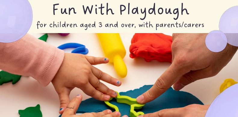 a child and adults hand playing with playdough