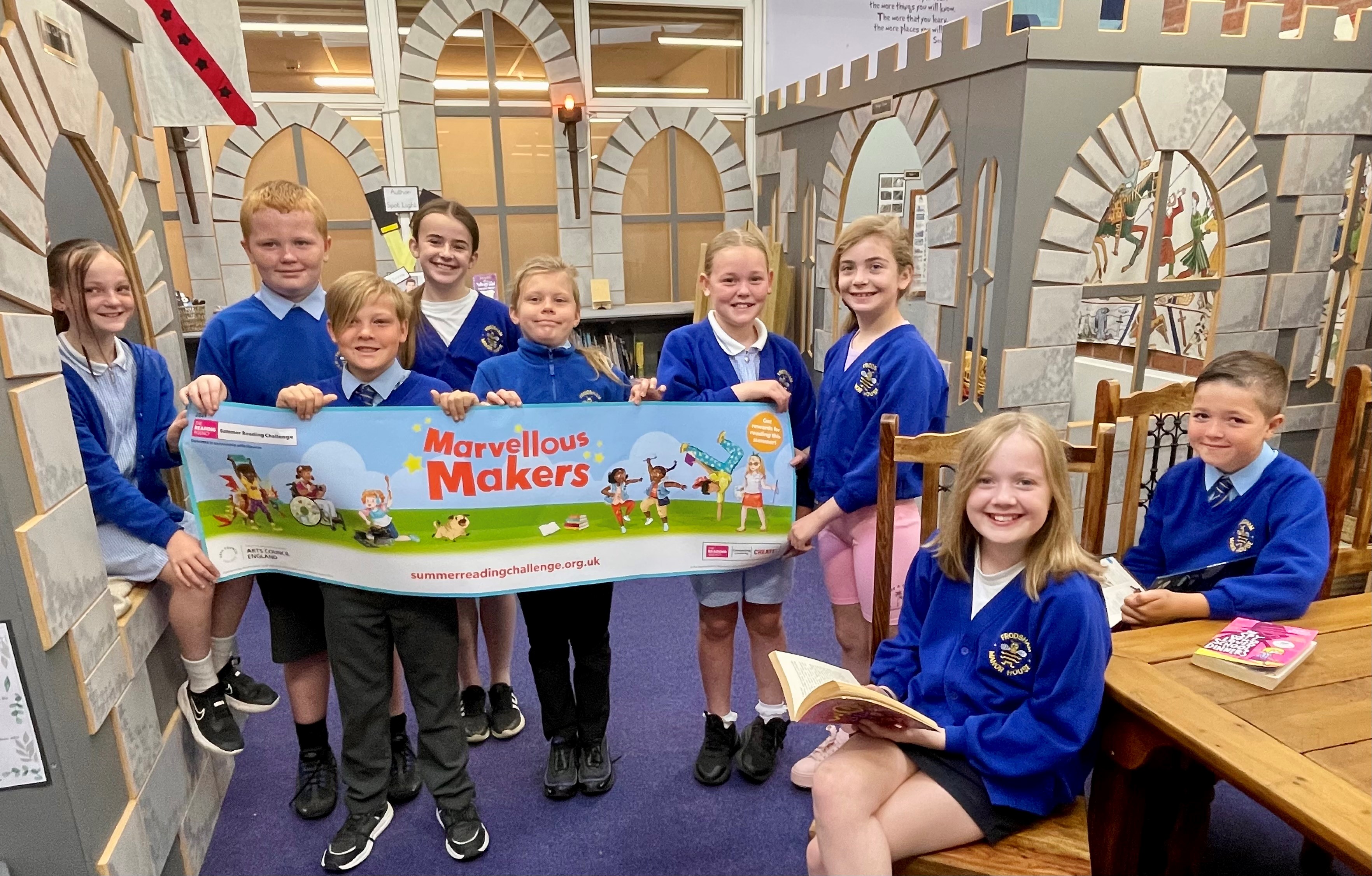 A group of children in school uniform promoting this year's Marvellous Makers