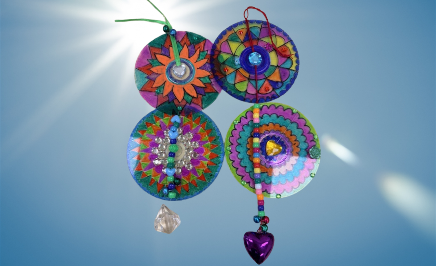 CDs decorated to make sun catchers 